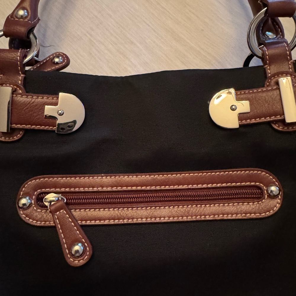 Etienne Aigner handbag
Shoulder Purse Canvas
Genuine Leather trim
